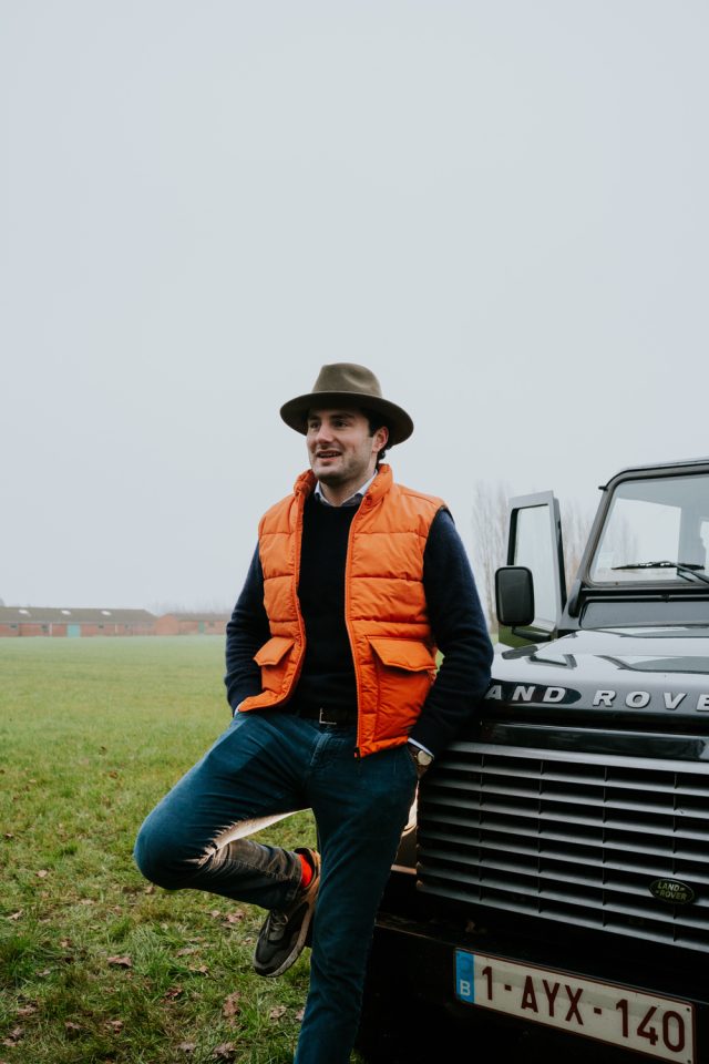 boy in bodywarmer orange