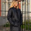 woman in navy parka bernamo