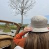 girl in bucket hat beige oldtimer