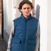 boy in blue vest with zipper