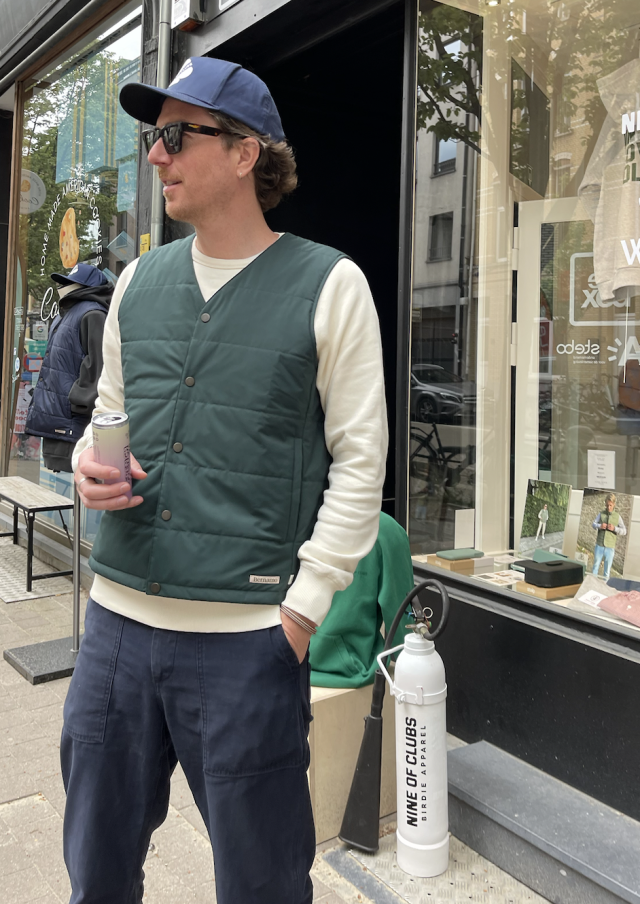 antwerp man in bottle green v-neck vest