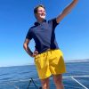 yellow swimming short ocean